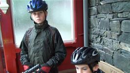 Sam declares he isn't cycling in the weather, as it tips down at Buttermere Youth Hostel